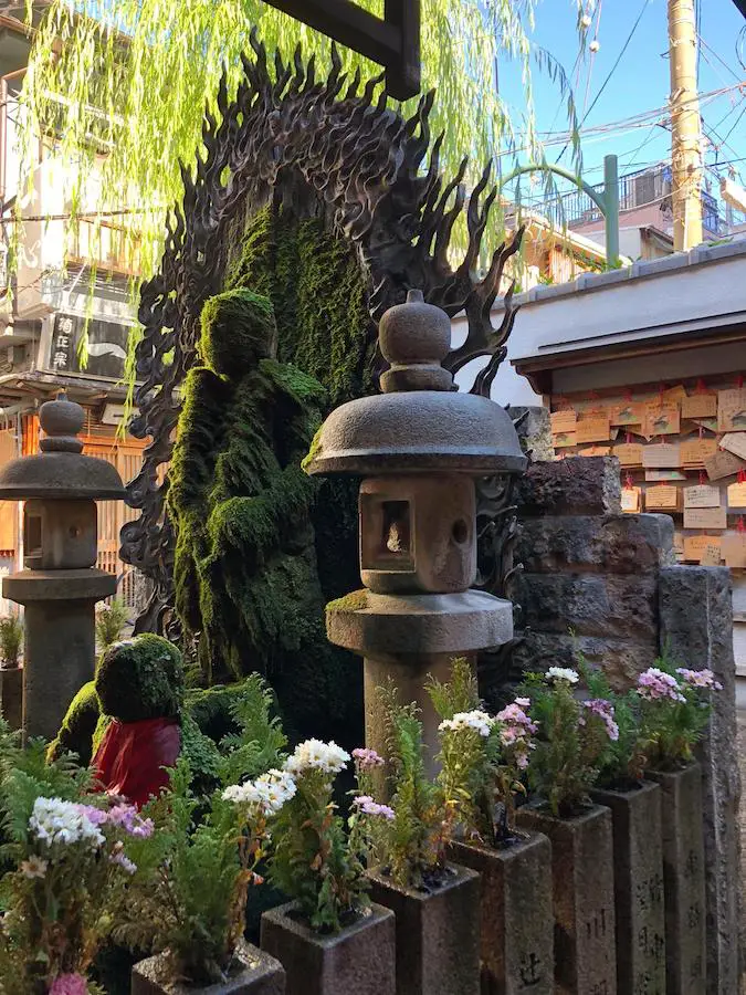 Moss covered buddha statue Osaka Hozenji Temple